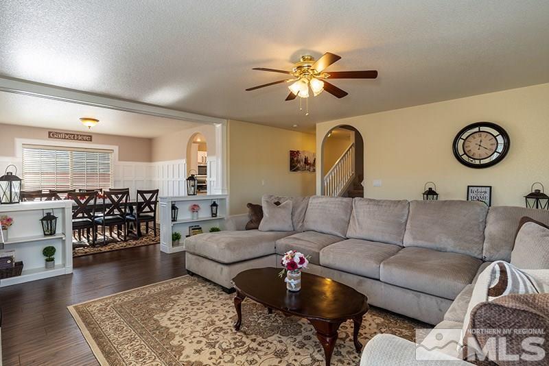 18366 Whitebark Court Reno, NV 89508 - Photo 3 of 36 a living room with furniture and wooden floor