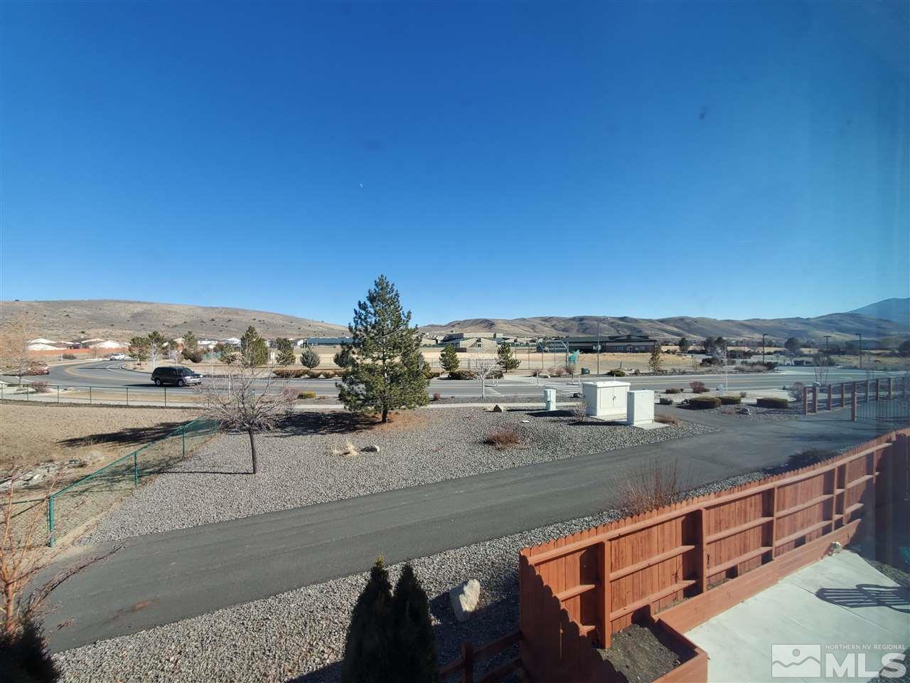 18366 Whitebark Court Reno, NV 89508 - Photo 32 of 36 a view of a terrace with skyline