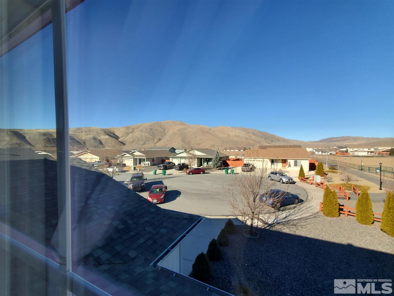 18366 Whitebark Court Reno, NV 89508 - Photo 33 of 36 a view of a terrace with sitting area