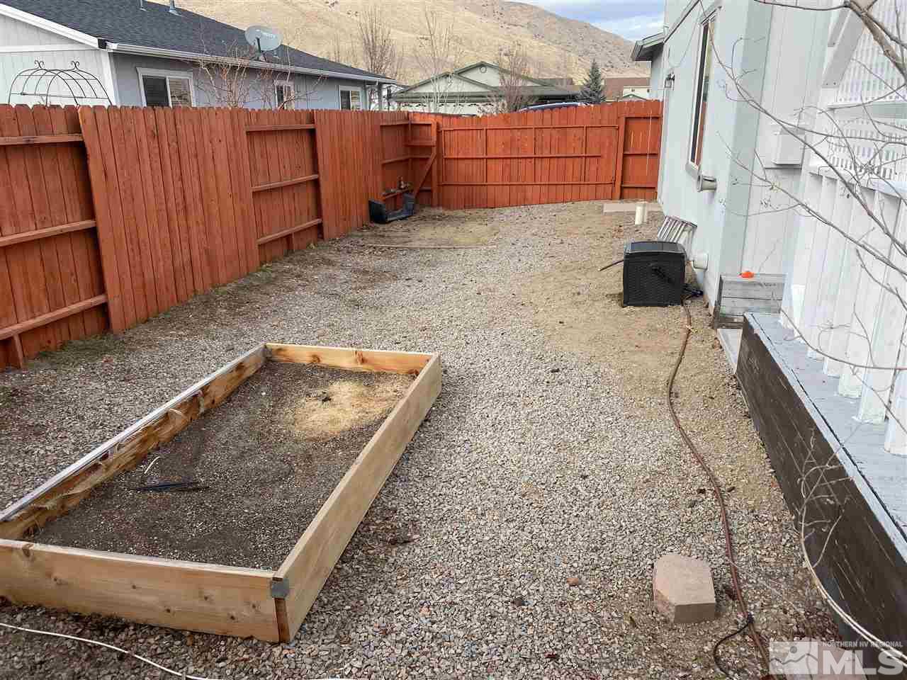 18366 Whitebark Court Reno, NV 89508 - Photo 34 of 36 a view of a backyard
