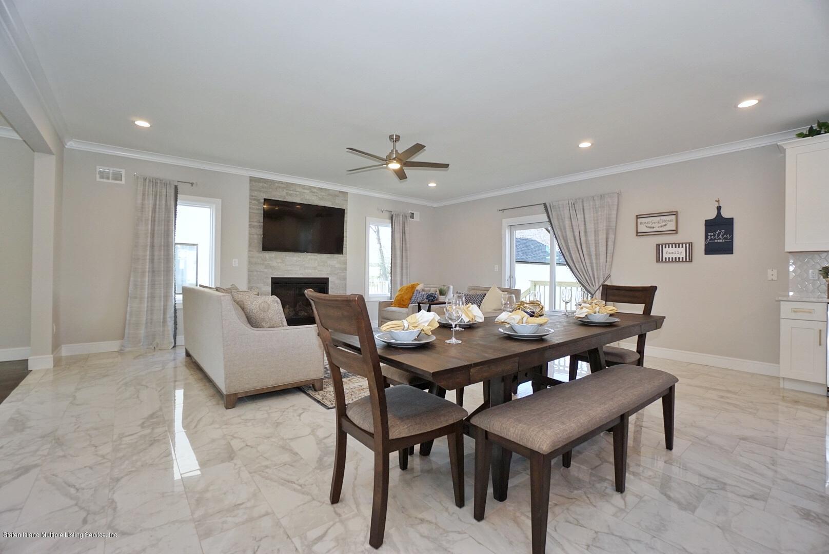 31 Torrice Loop Staten Island, NY 10309 - Photo 22 of 69 a view of a dining room with furniture