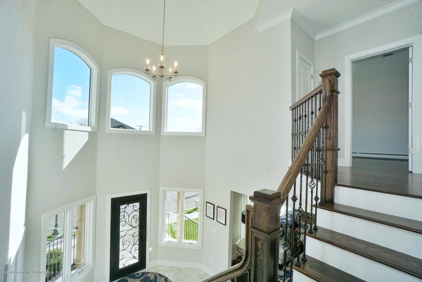 31 Torrice Loop Staten Island, NY 10309 - Photo 30 of 69 a view of a dining room with furniture and wooden floor