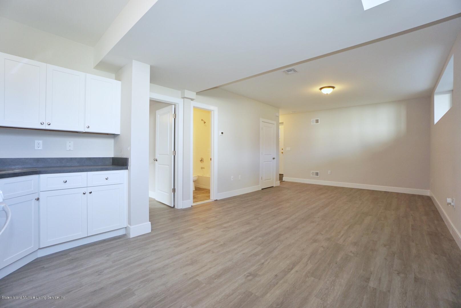 31 Torrice Loop Staten Island, NY 10309 - Photo 58 of 69 a view of a kitchen with wooden floor