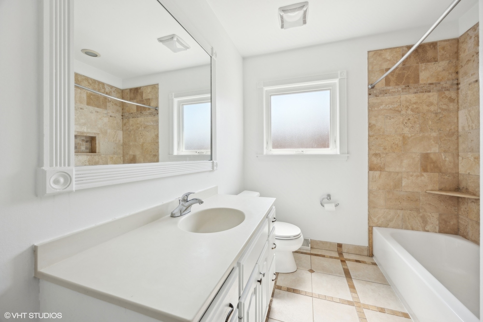 8152 Mayfield Avenue Burbank, IL 60459 - Photo 14 of 27 a bathroom with a sink a toilet and shower