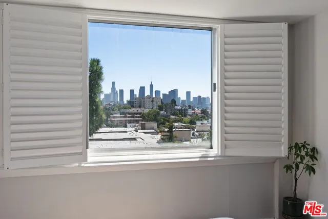 a view of a city with tall buildings