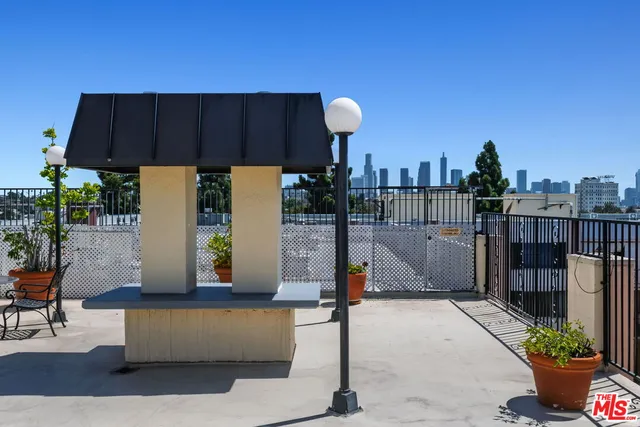 a view of a chairs and table in the terrace