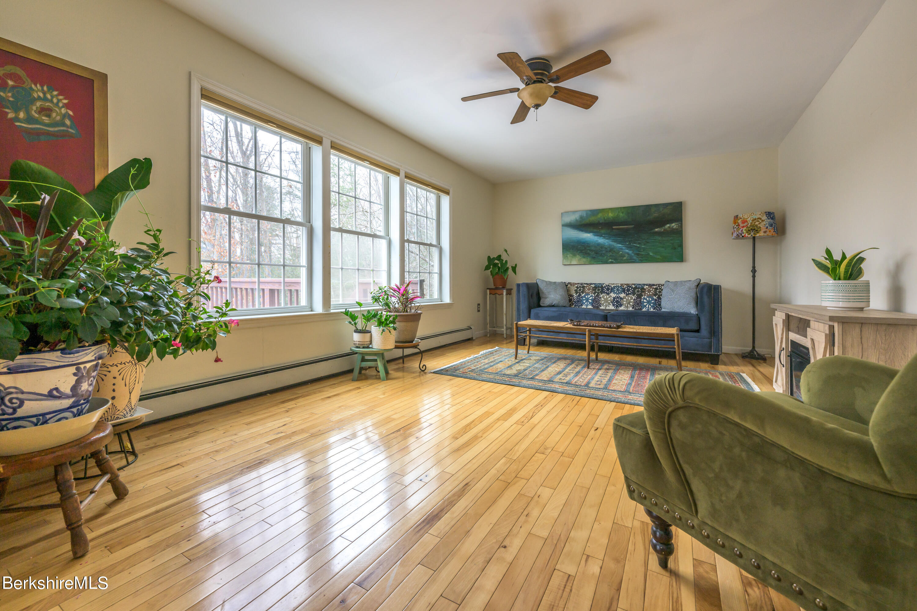 15 Alma Street Pittsfield, MA 01201 - Photo 11 of 35 a living room with furniture and a large window