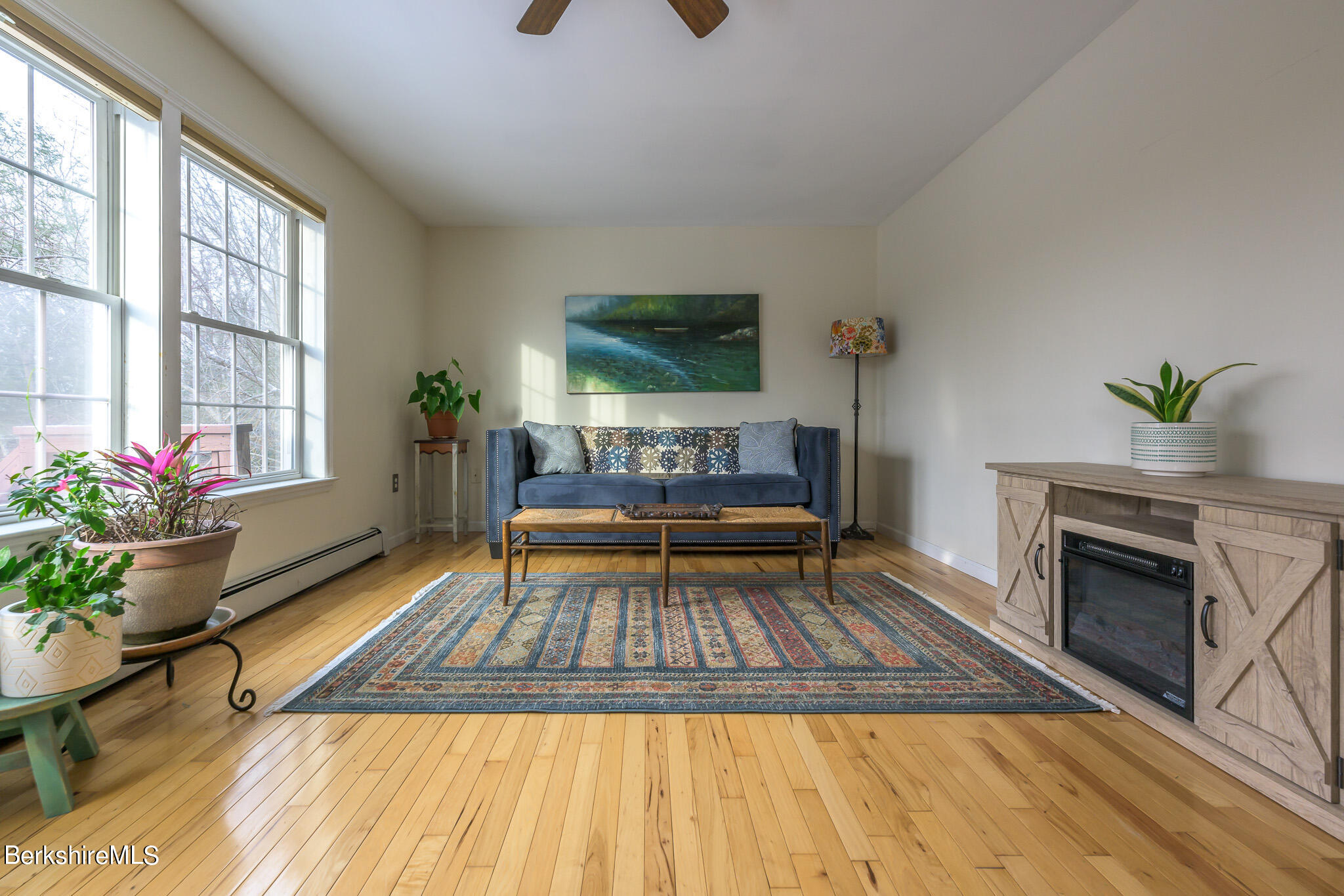 15 Alma Street Pittsfield, MA 01201 - Photo 12 of 35 a living room with furniture and a fireplace