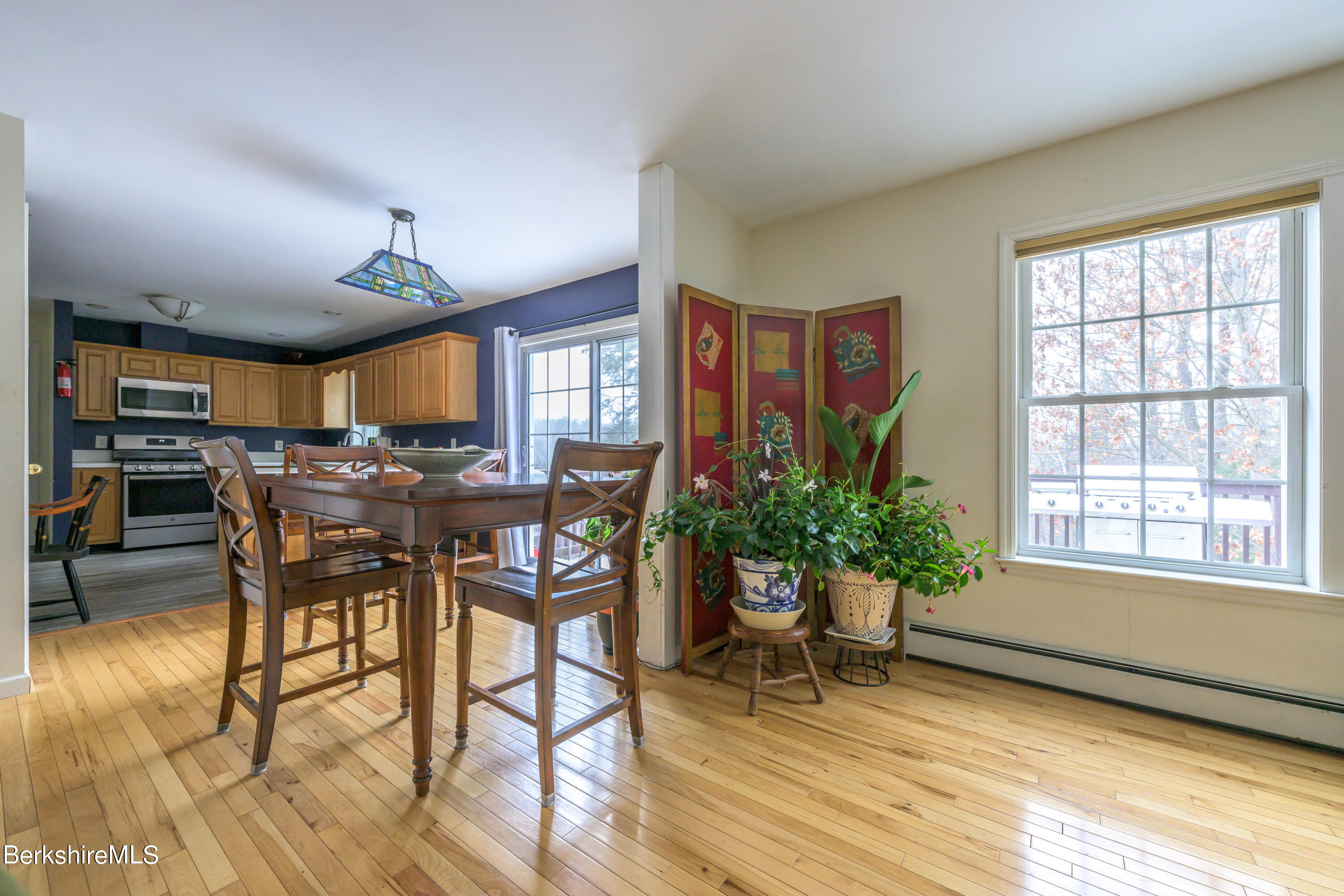15 Alma Street Pittsfield, MA 01201 - Photo 14 of 35 a view of a dining room with furniture window and wooden floor