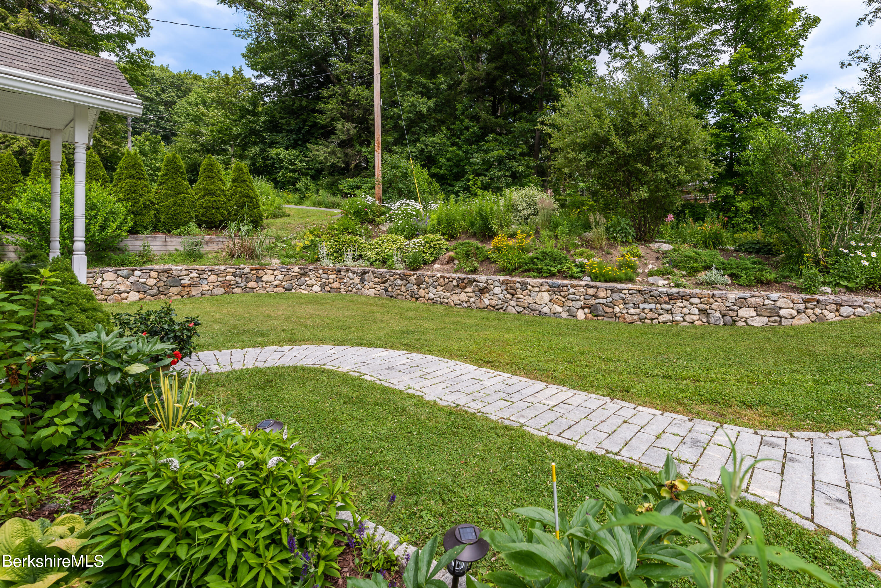 15 Alma Street Pittsfield, MA 01201 - Photo 2 of 35 a view of a golf course with a garden