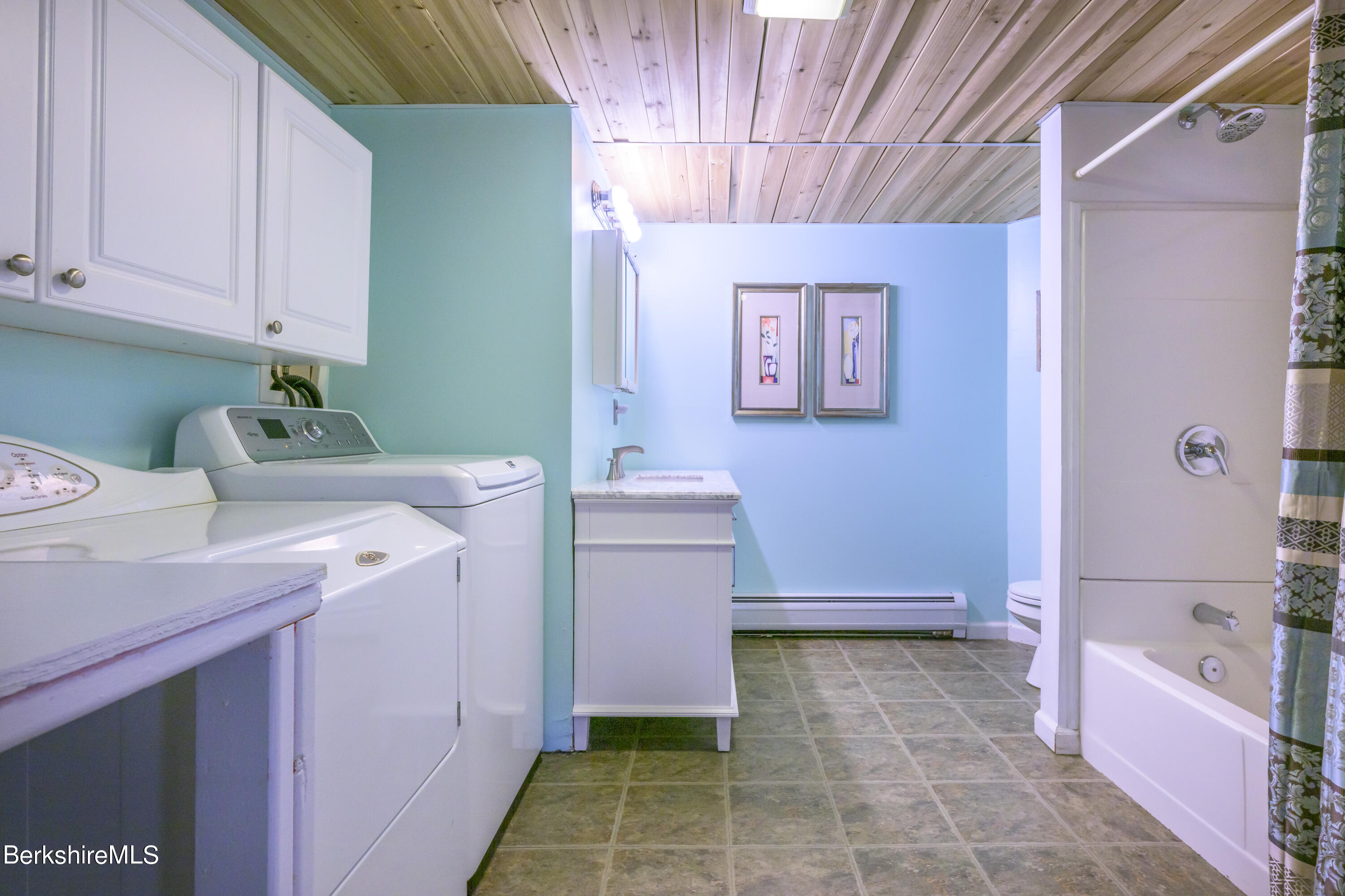 15 Alma Street Pittsfield, MA 01201 - Photo 26 of 35 a bathroom with a sink a toilet and bathtub