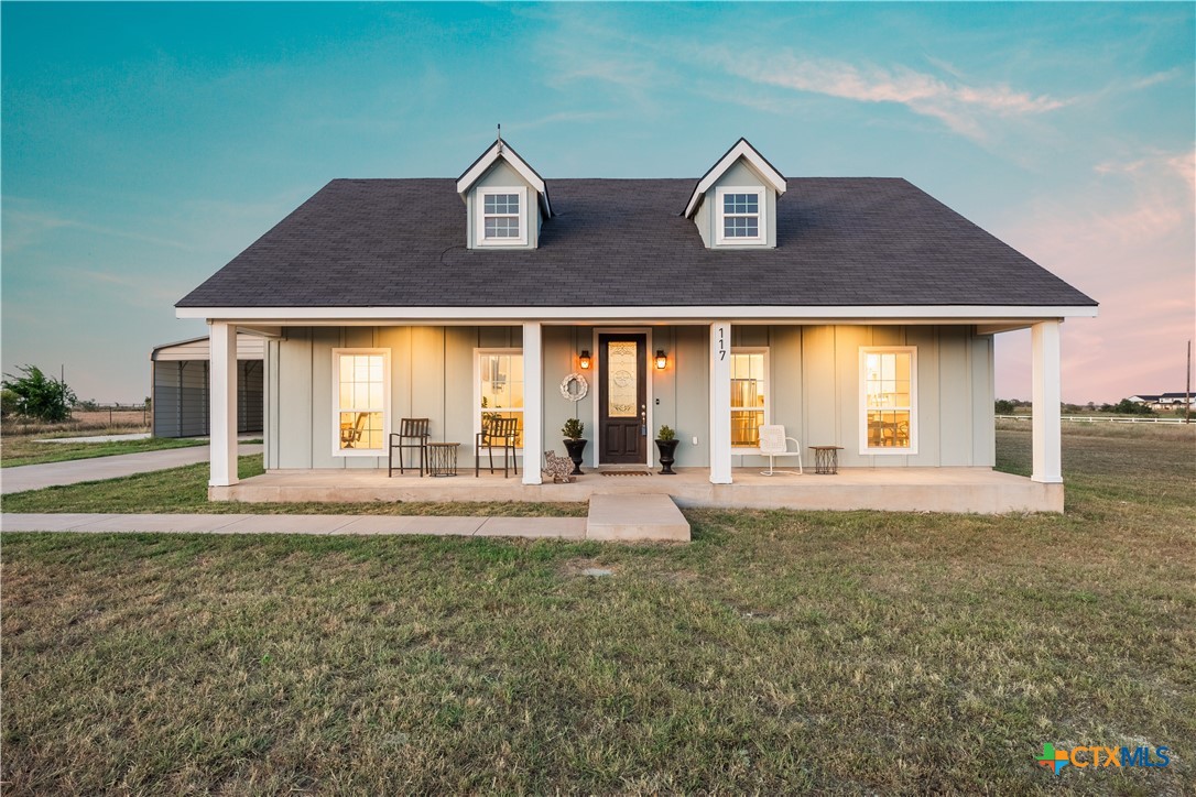 117 Lila Lane Bertram, TX 78605 - Photo 1 of 1 a front view of house with yard