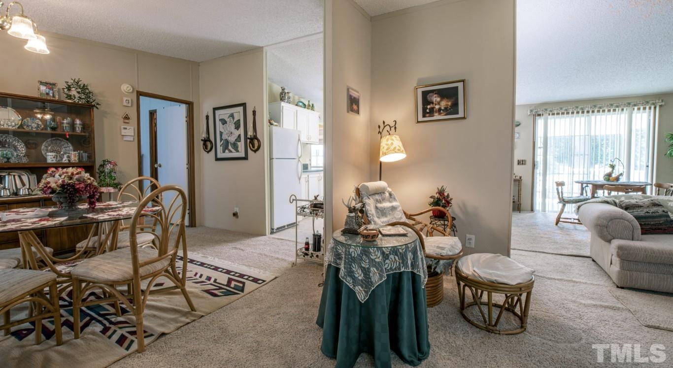 12411 West Old Spring Hope Road Middlesex, NC 27557 - Photo 6 of 28 a living room with furniture and a window