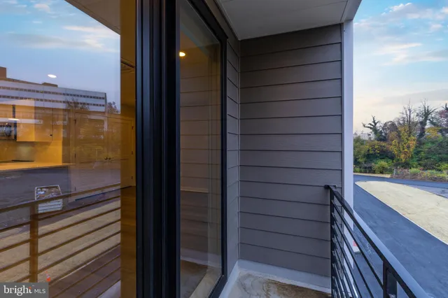 a view of kitchen with wooden floor