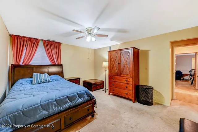 a bedroom with a bed and a closet