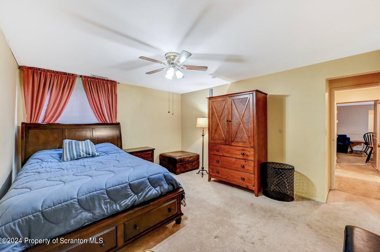 1102 Summit Pointe Scranton, PA 18508 - Photo 21 of 37 a bedroom with a bed and a closet