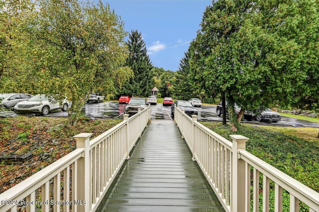 1102 Summit Pointe Scranton, PA 18508 - Photo 36 of 37 a view of a balcony with wooden stairs