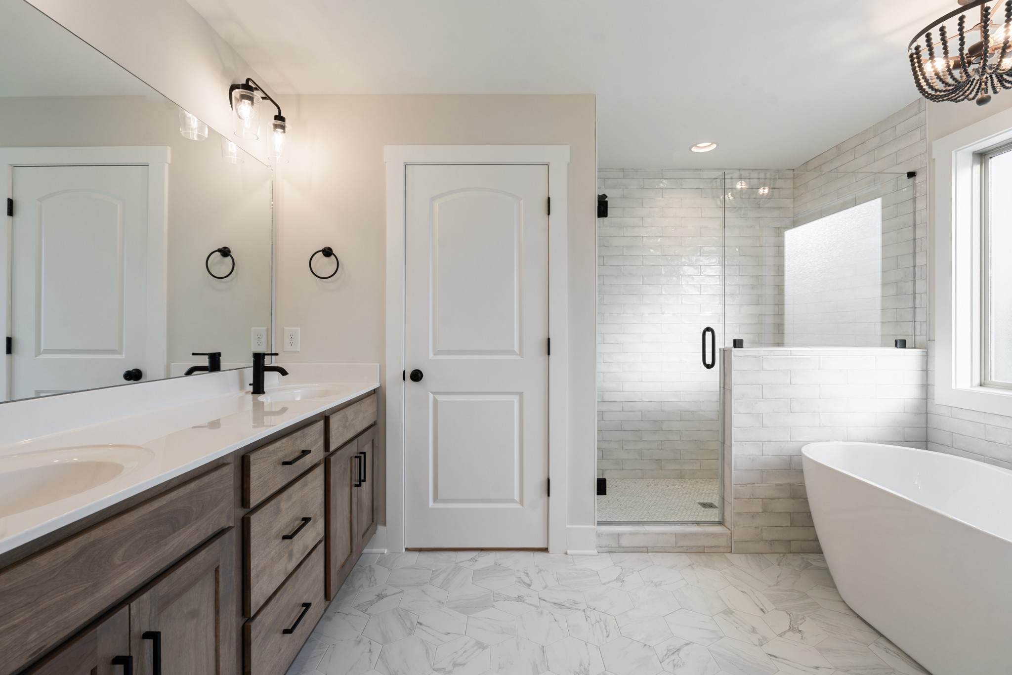 8078 Gideon Road Greenbrier, TN 37073 - Photo 19 of 26 a bathroom with a tub sink and mirror
