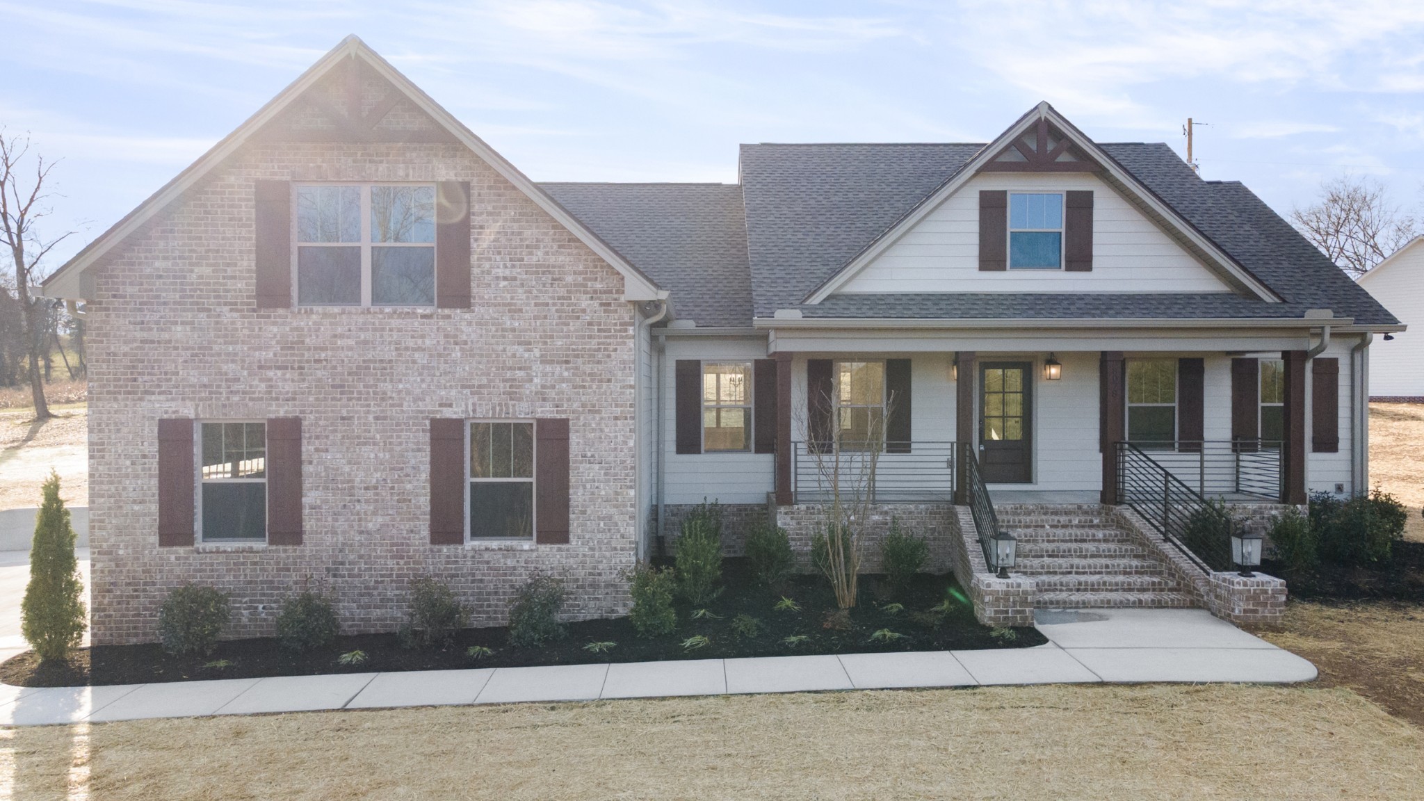 8078 Gideon Road Greenbrier, TN 37073 - Photo 2 of 26 a front view of a house with garden