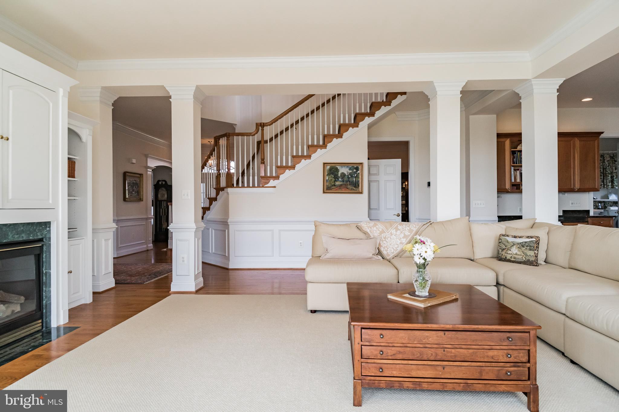 8514 Link Hills Loop Gainesville, VA 20155 - Photo 12 of 65 Family Room looking toward staircase