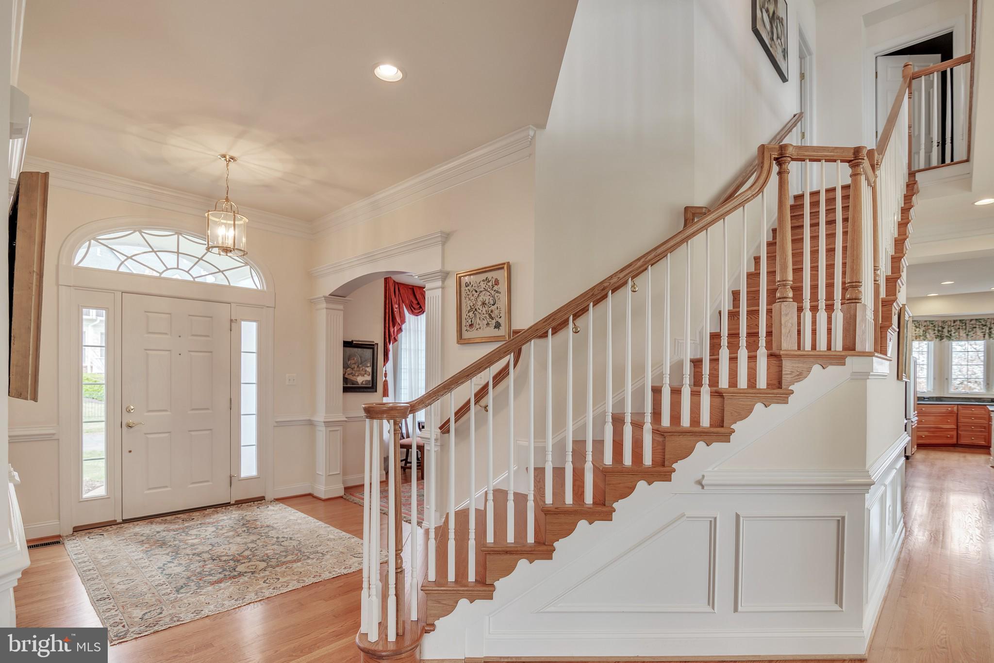 8514 Link Hills Loop Gainesville, VA 20155 - Photo 35 of 65 Upgraded Oak Staircase