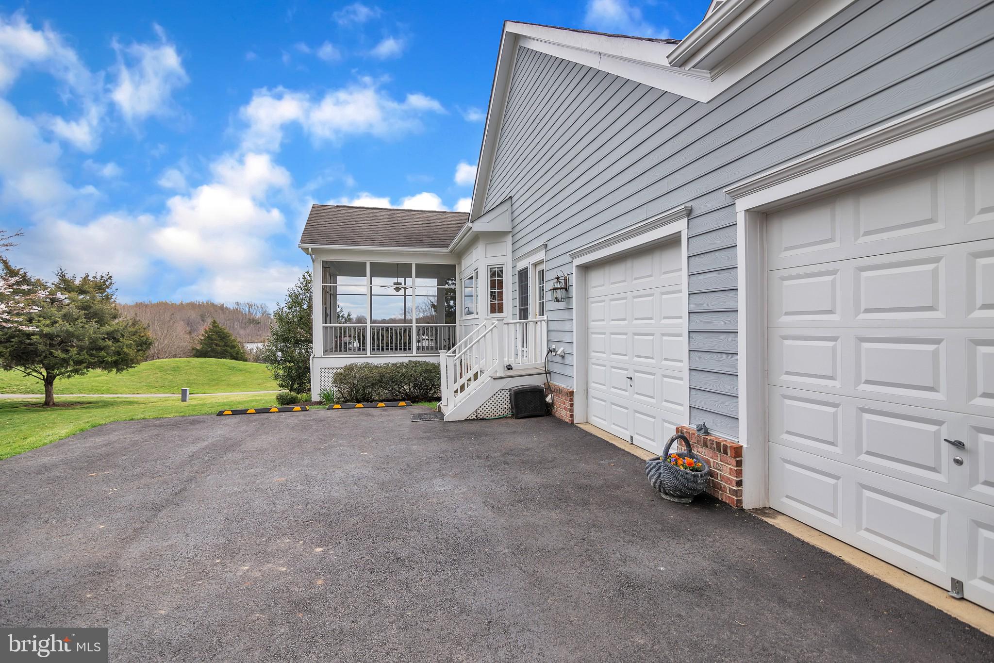 8514 Link Hills Loop Gainesville, VA 20155 - Photo 53 of 65 Expanded 2 car side load garage, Door to mud room