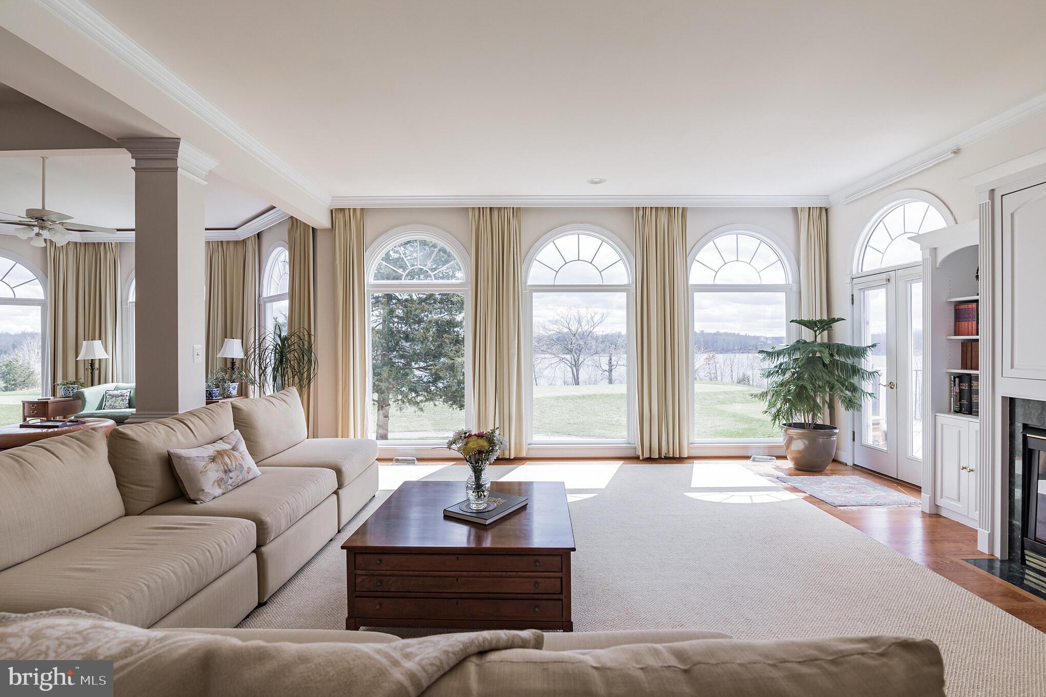 8514 Link Hills Loop Gainesville, VA 20155 - Photo 8 of 65 Family Room w/ Views of Golf Course and Lake