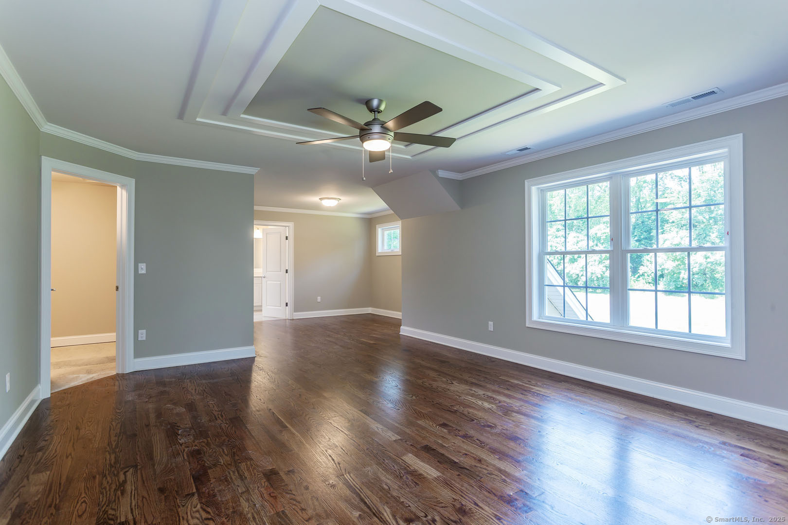 Lot1 Deerwood Road Oxford, CT 06478 - Photo 26 of 33 a view of an empty room with wooden floor and a window