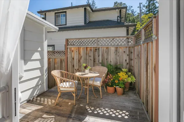 a bed room with a bed and a chair