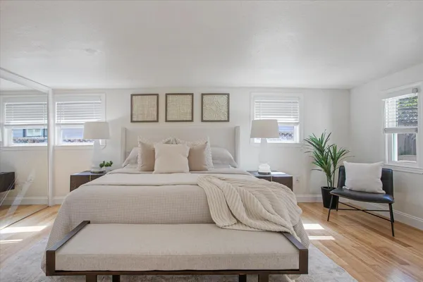 a view of a house with a flower garden