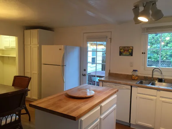 a view of house with outdoor seating space