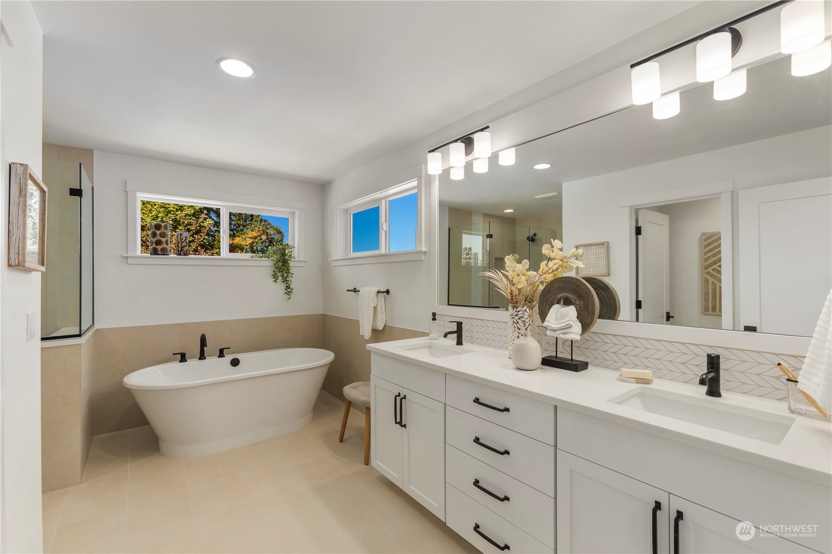 4211 217th Place Southeast Bothell, WA 98021 - Photo 19 of 26 a bathroom with a double vanity sink mirror and bathtub