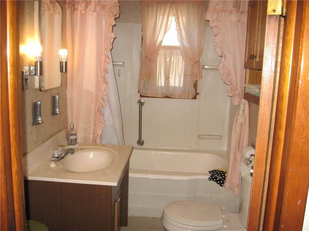 FULL BATH LOCATED ON MAIN LEVEL