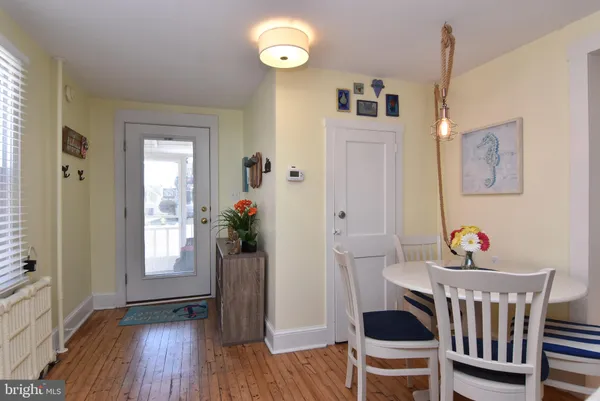 a kitchen with sink and cabinets