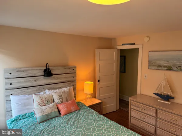 a view of a storage room with furniture and a washer