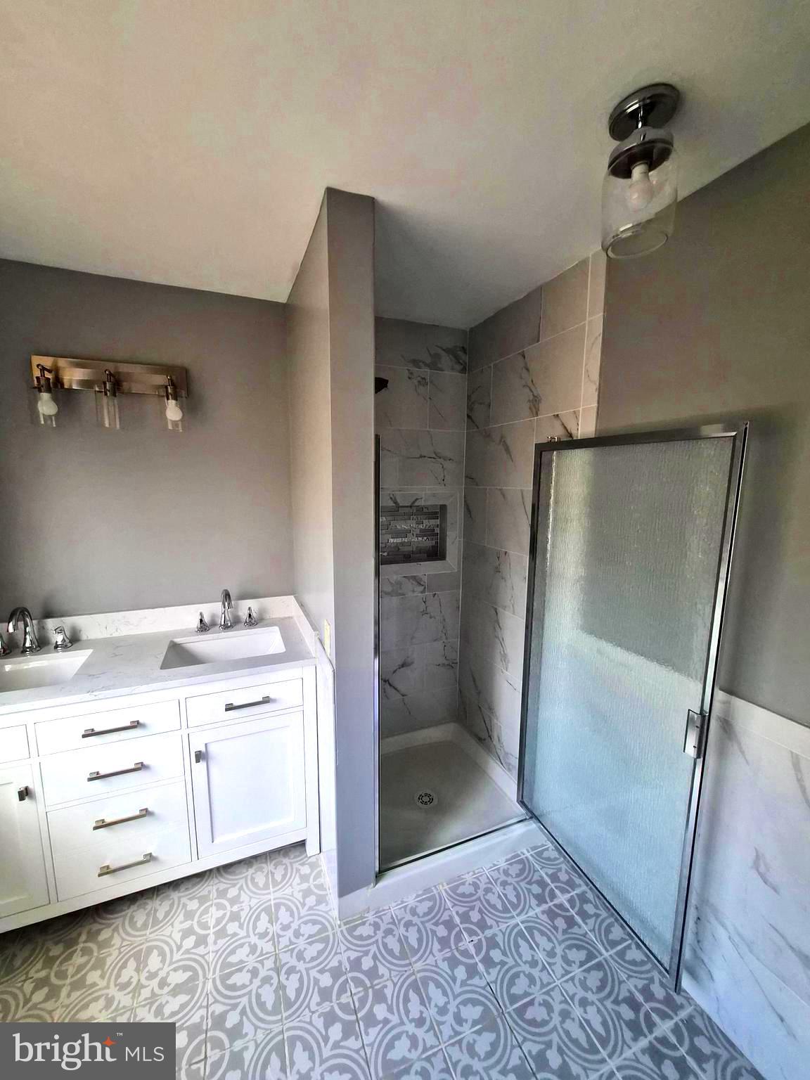 7120 Winter Rose Path Columbia, MD 21045 - Photo 20 of 28 a bathroom with a shower and a sink