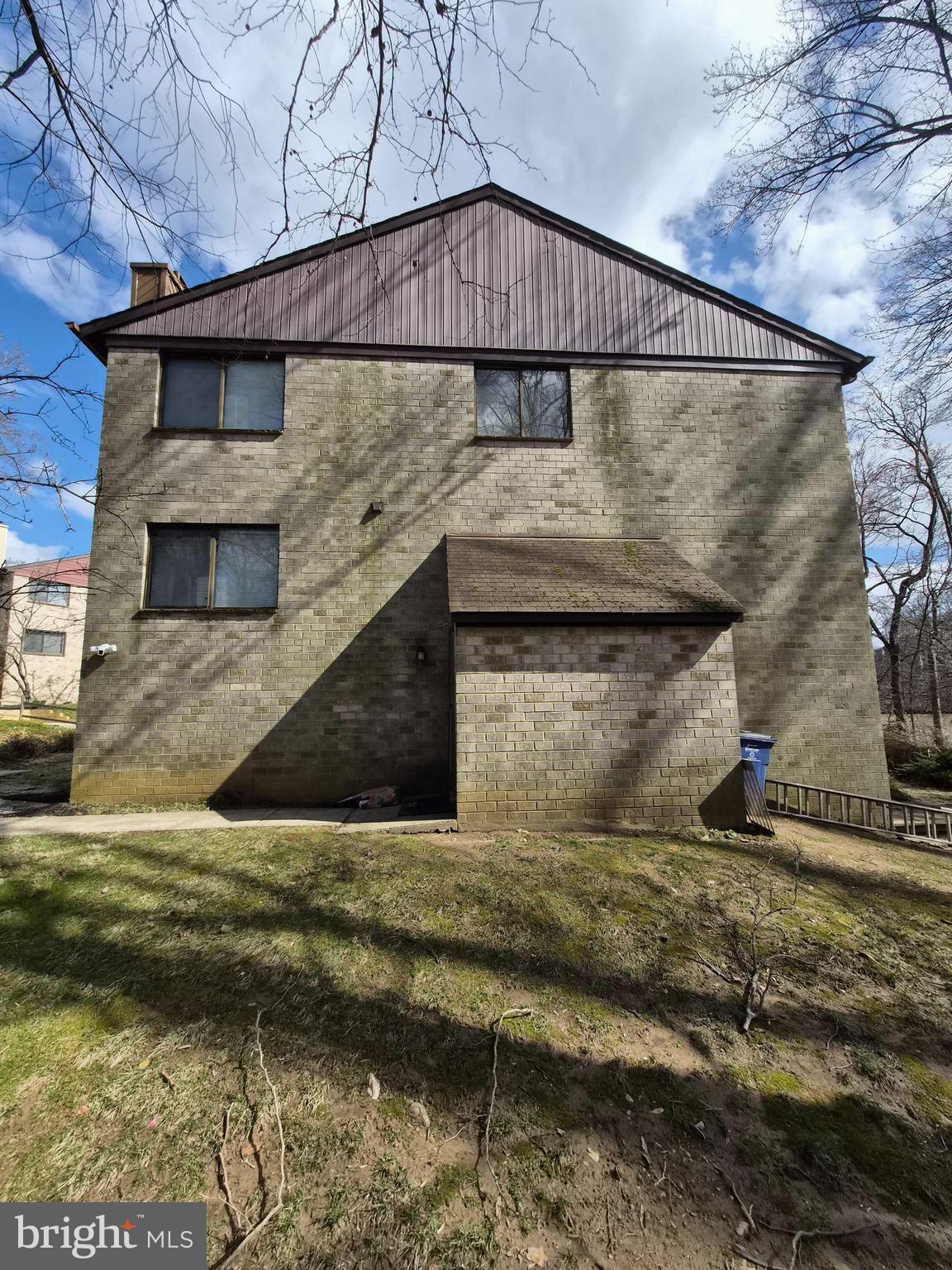 7120 Winter Rose Path Columbia, MD 21045 - Photo 3 of 28 a view of a house with a wooden fence