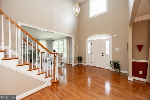 a kitchen with a table and chairs in it