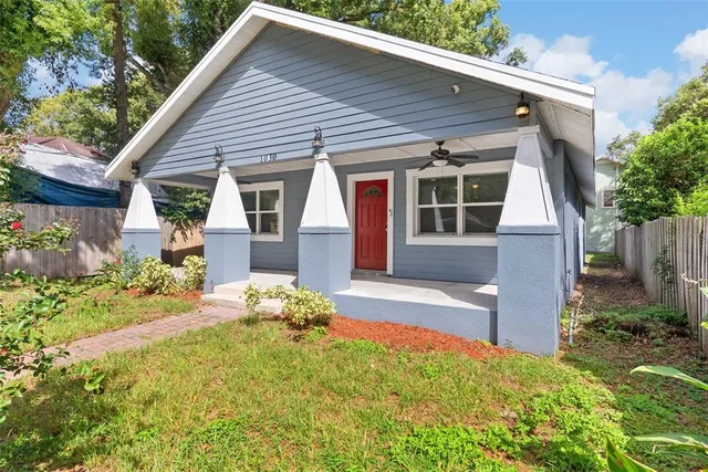 front view of a house with a yard