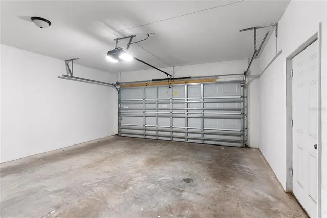 a front view of a house with garage