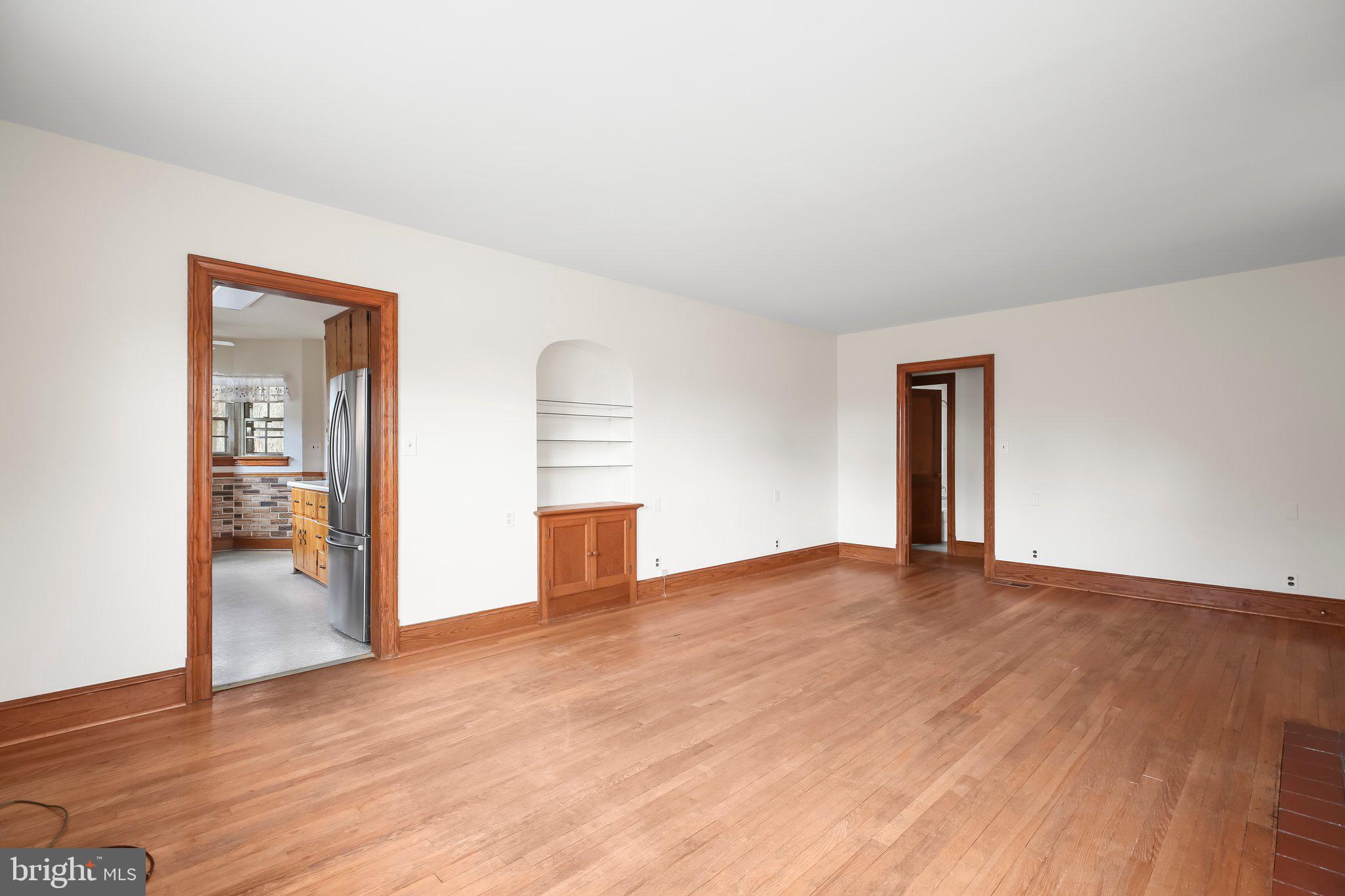 19192 Partlow Road Beaverdam, VA 23015 - Photo 6 of 26 a view of empty room with wooden floor