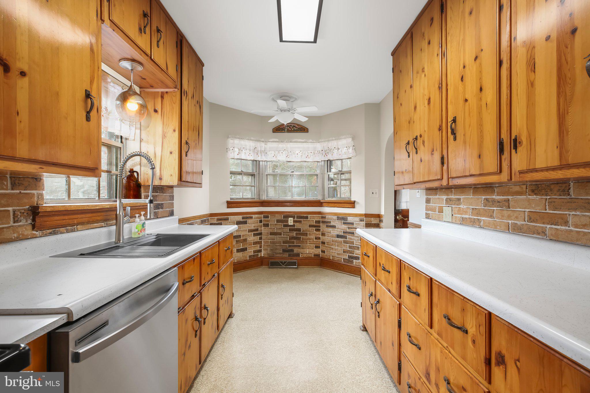 19192 Partlow Road Beaverdam, VA 23015 - Photo 9 of 26 a kitchen with a sink and a window