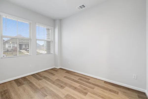 a view of a room that has a window in it