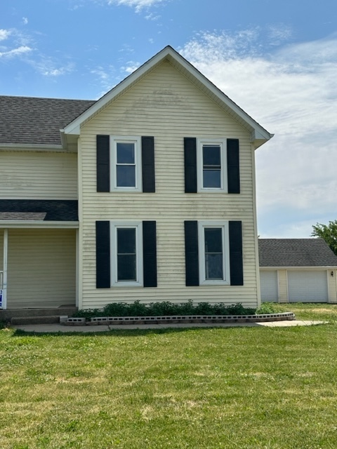 741 Sterling Road Dixon, IL 61021 - Photo 1 of 21 a front view of a house with a yard