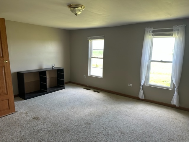 741 Sterling Road Dixon, IL 61021 - Photo 11 of 21 a view of an empty room with a window