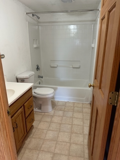 741 Sterling Road Dixon, IL 61021 - Photo 12 of 21 a bathroom with a sink a toilet and shower