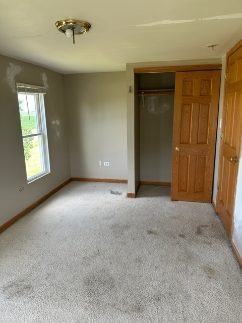 741 Sterling Road Dixon, IL 61021 - Photo 14 of 21 an empty room with windows and cabinet