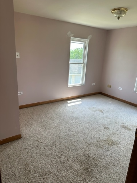 741 Sterling Road Dixon, IL 61021 - Photo 16 of 21 an empty room with a window