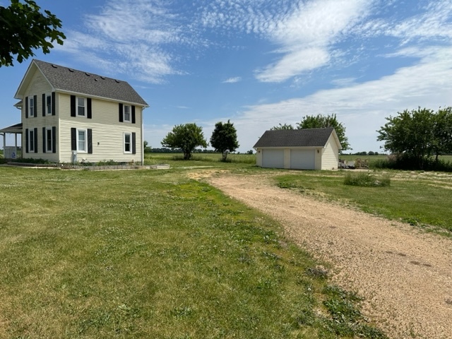 741 Sterling Road Dixon, IL 61021 - Photo 19 of 21 a view of a big house with a big yard and large trees