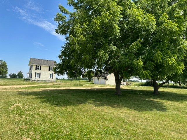 741 Sterling Road Dixon, IL 61021 - Photo 21 of 21 a view of pool with lawn chairs and large trees